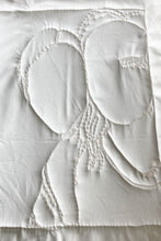 A TEXTILE PICTURE WITH FRAME ON ORDER