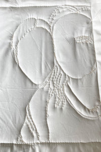 A TEXTILE PICTURE WITH FRAME ON ORDER
