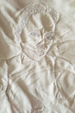 A TEXTILE PICTURE WITH FRAME ON ORDER