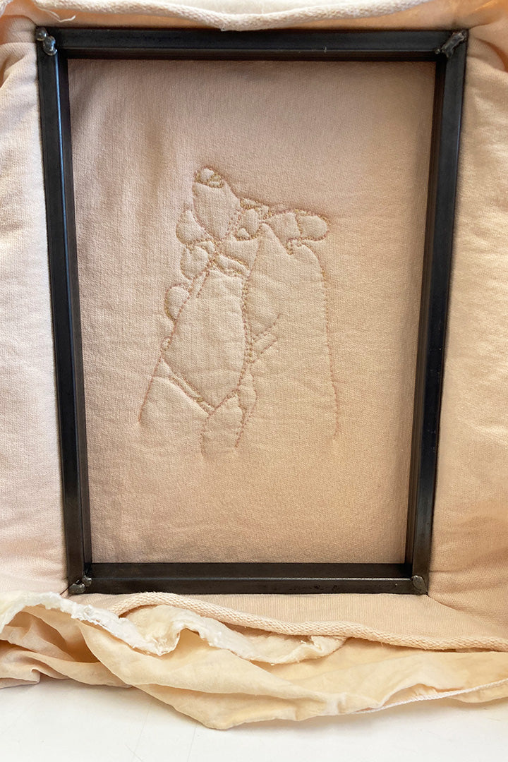 A TEXTILE PICTURE WITH FRAME ON ORDER